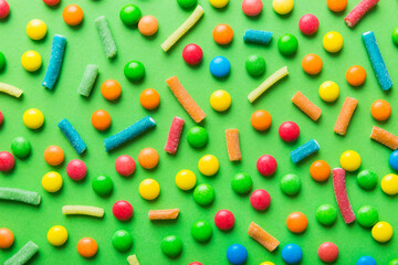colorful candies as background top view. Seamless pattern with candy. Many sweet candies close-up