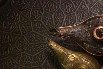 Aladdin's magic lamp isolated on black background