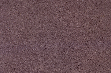 surface texture background of brown sponge foam material with rough pores