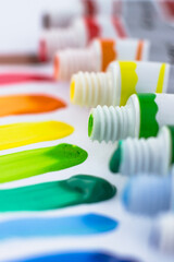 Rainbow brushstrokes with close-up paint. Paints on a white background