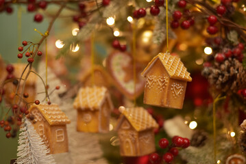 New Year. Toys on the Christmas tree in the form of houses