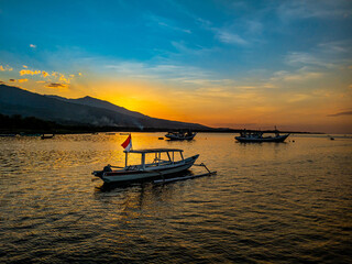 the view of the beach atmosphere in the evening with the sunset