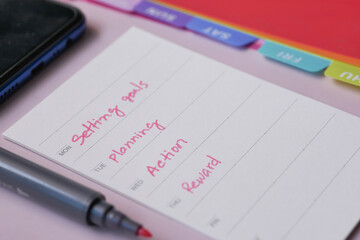 tick mark on planning goals on notepad 