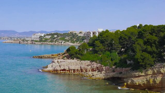 Beautiful landscape of rock formations on the La Pineda beach in Salou Spain.