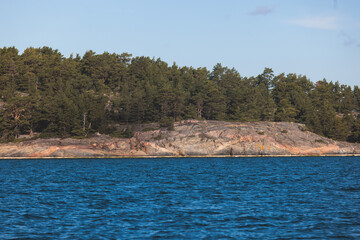 Archipelago National Park landscape, Southwest Finland, with islands, islets and skerries, Saaristomeren kansallispuisto, summer sunny day, view from shuttle ship ferry boat in the Archipelago Sea