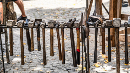 blacksmiths hammers on the rake