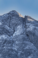 snow covered mountains with blue sky, clouds a little bit sun - Zugspitze, Alps