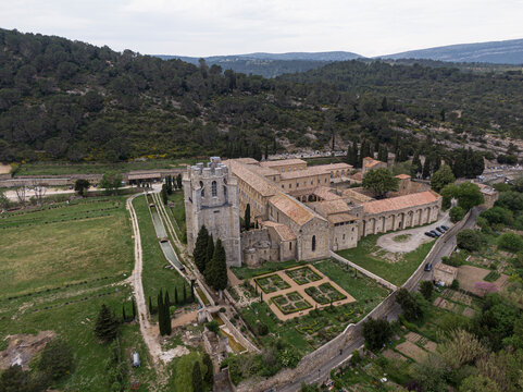 Aerial view of Lagrasse medieval city, Aude, Occitanie. the city is built along the river Orbieu