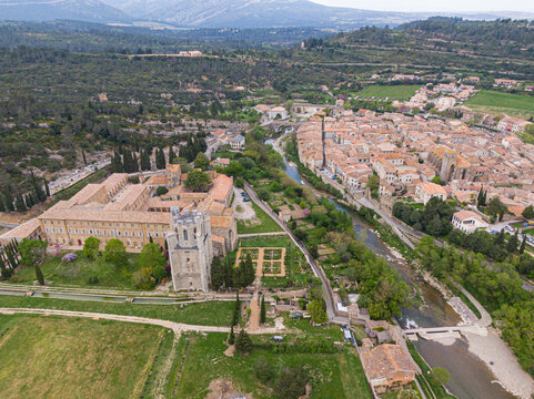 Aerial view of Lagrasse medieval city, Aude, Occitanie. the city is built along the river Orbieu
