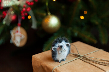Felted hedgehog on a present box Christmas present