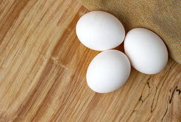 Eggs on a wooden background.