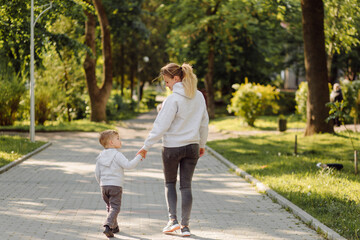 Obraz premium mother and son have activities together on holidays