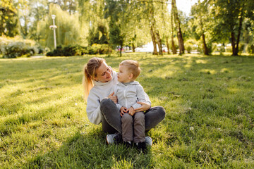 Naklejka na ściany i meble mother and son have activities together on holidays
