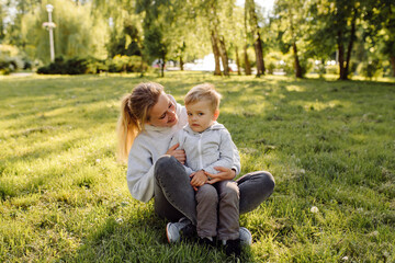 Naklejka na ściany i meble mother and son have activities together on holidays