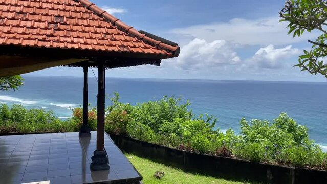 Ocean viewed from Gunung Payung Temple, Badung Regency, Bali, Indonesia. There is a resting place to enjoy the view.