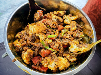 Closeup of making mixed pickle at home