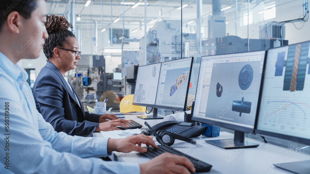 Leinwandbilder factory office room: industrial engineers developing models of a heavy industry machine parts on a c