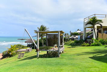 rustic gazebo in the garden, oceanfront condo, oceanfront hotel, lawn with wooden gazebo, large...