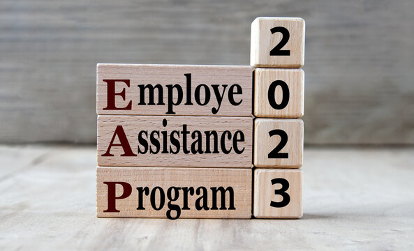 Worker Assistance Program 2023 - words on wooden blocks on gray background