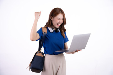 Portrait of happy young asian student girl using laptop computer isolated over white background