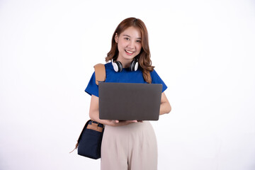 Portrait of happy young asian student girl using laptop computer isolated over white background