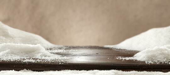 Desk of free space and winter background of snow 