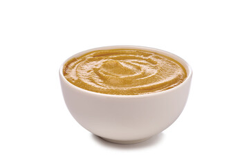 Mustard sauce in bowl on white background