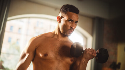 Portrait of a Strong Athletic Black Man Doing Shirtless Workout at Home, Training with Dumbbells. Fit Muscular Sportsman Staying Healthy, Training at Home. Sweat, Determination