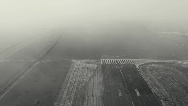 Foggy Abandonded airport runway