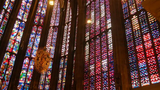 Aachen, Germany - October 10, 2022: Beautiful vintage stained glass windows inside in front of the altar of the ancient Aachen Cathedral
