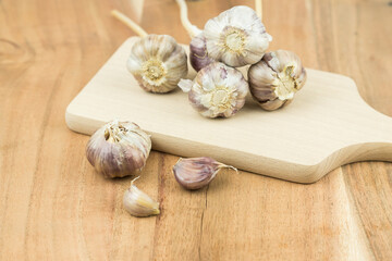 garlic on a wooden surface