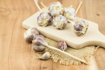 garlic on a wooden surface