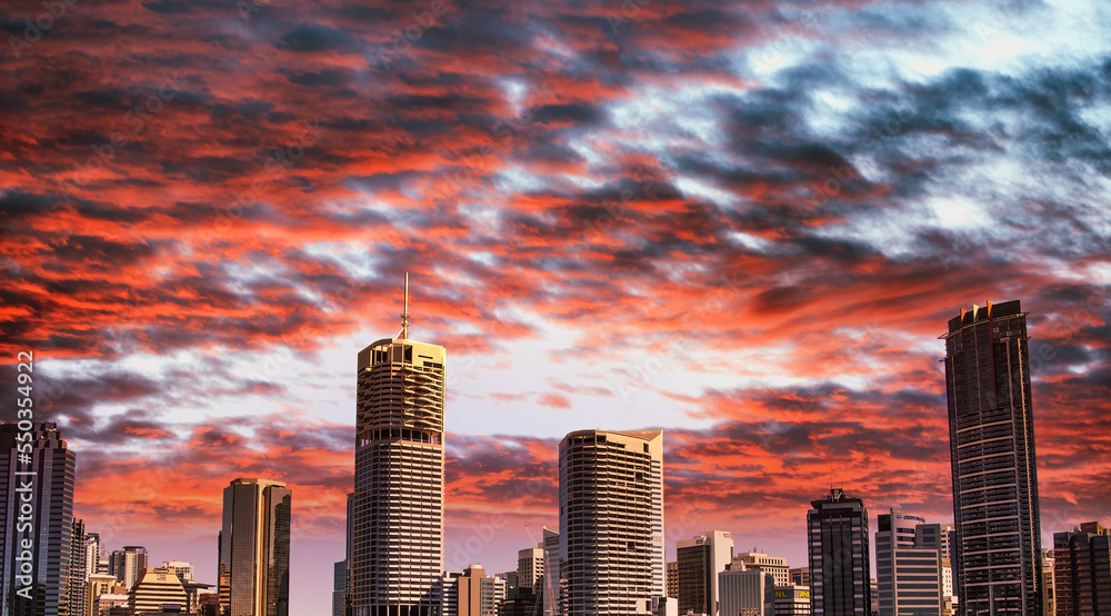 Poster brisbane, australia. city skyline from story bridge over brisbane river at sunset