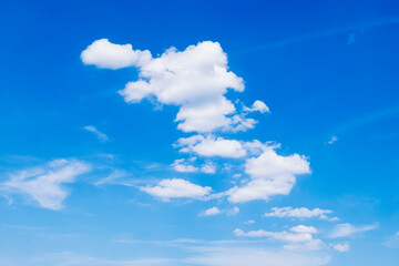 White clouds in the blue sky. Perfect cloudscape background.