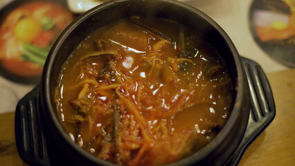 Korean traditional food Kimchi soup hot serve on pot