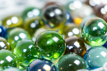 Lots of green glass beads, close-up balls.