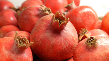 Close-up of many beautiful ripe pomegranates
