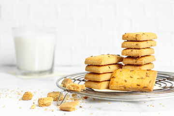 Fototapeta na wymiar cookies stacked with milk on white background 