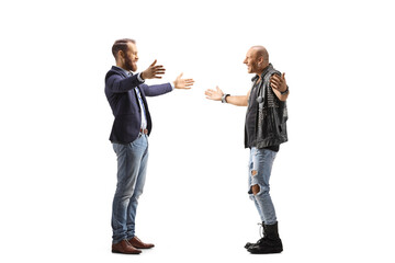 Fototapeta premium Full length profile shot of a young professional man meeting a punk