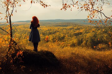Wide shot of a young woman standing on a hill overlooking a forest during autumn, the trees have oranges reds and yellow fall leaves, the woman has long curly strawberry blonde hair