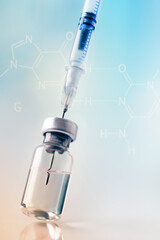 Glass vial and syringe with injection over blue background. Vaccination or beauty therapy concept. - obrazy, fototapety, plakaty