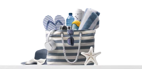 Zelfklevend Fotobehang PNG file no background Beach bag with accessories and tropical beach © stokkete