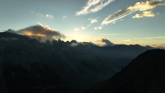 sunset in the french alps ecrins national park silhouette mountains peak