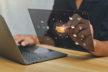 Document Management System (DMS), online documentation database and process automation to efficiently manage files, knowledge and documentation in enterprise with ERP. IT consultant working on laptop