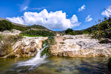 Naklejka na ściany i meble Small stream springtime in Ano Meria, Syros island, Cyclades, Greece