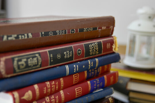 pile of ancients Jewish Talmud and Gemara books was photographed in Israel. placed on top of each other in a close-up shot