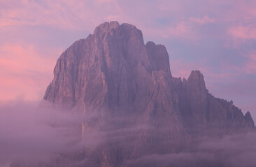 The northern side of Sasso Lungo at sunrise from the Val Gardena area