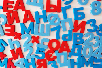 Russian letters and numbers. Red vowels and blue consonants on a white background. High quality...