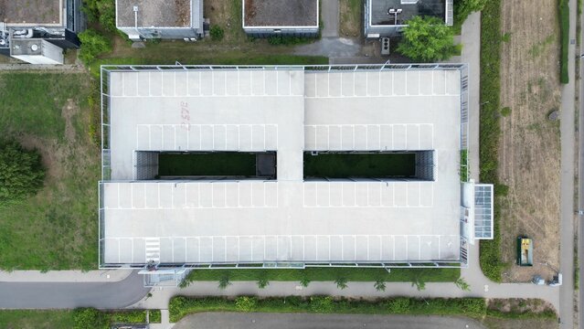 Aerial shot of a parking lot during the day
