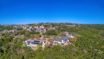 Austin, Texas-Mansions and villas on top of a mountain in aerial view